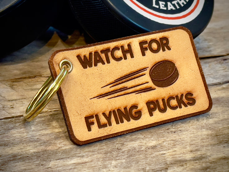 Watch For Flying Pucks Keychain